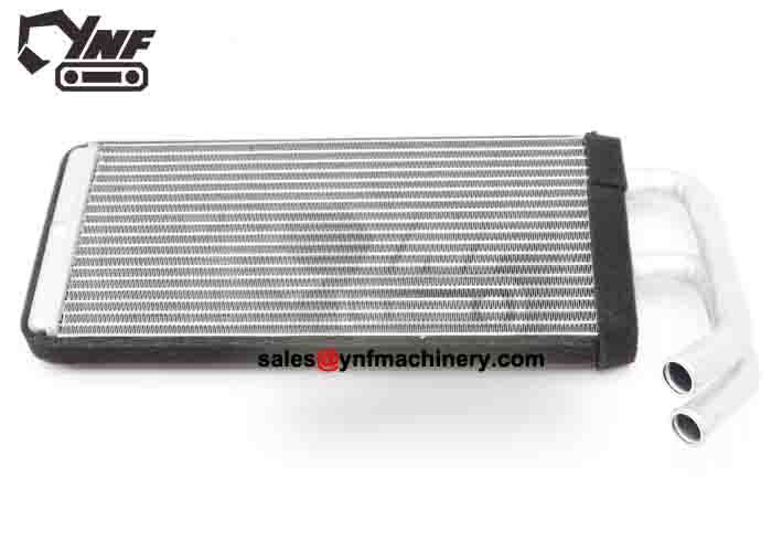 Compact heater radiator for heavy equipment cabins