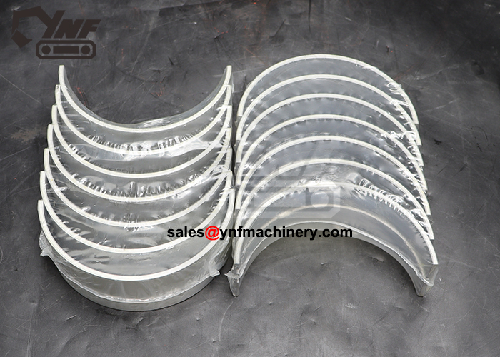 Engine bearing set for hydraulic excavator