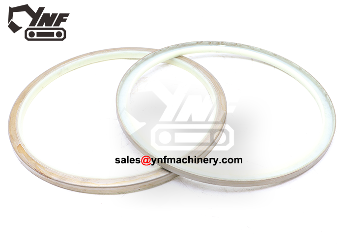 Bucket arm shaft dust seal