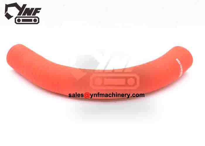 Excavator lower water hose