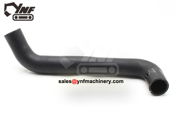 XE135B coolant hose low position