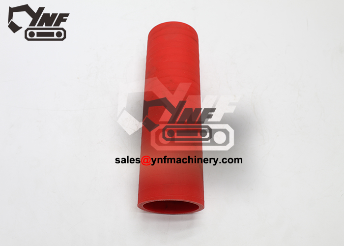 PC130 radiator-to-engine cooling pipe