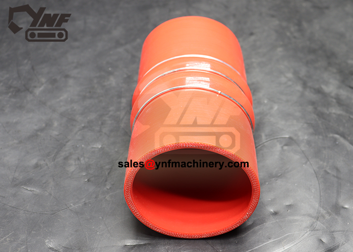 Reinforced custom engine air hose with spring