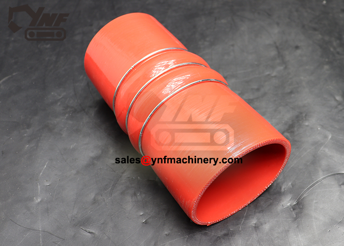 Reinforced custom engine air hose with spring