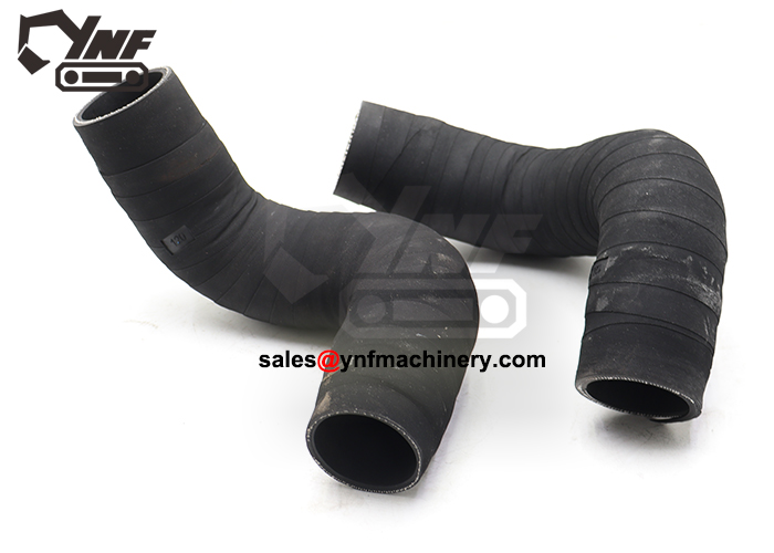 Engine air hose connecting air filter to intake system