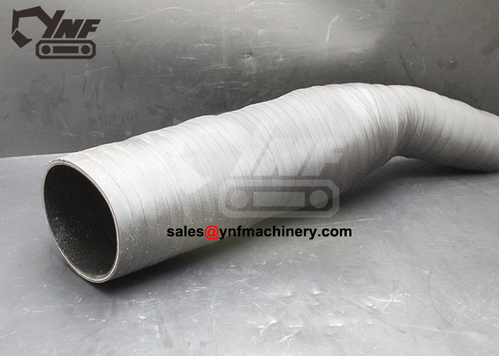 Engine air intake pipe for excavator airflow system
