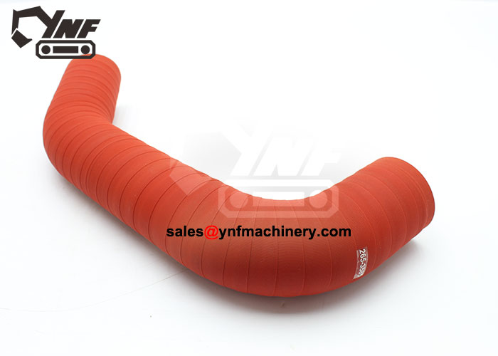 Excavator engine induction hose