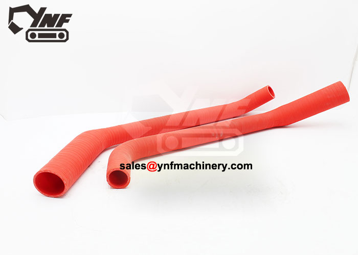 Excavator engine induction hose