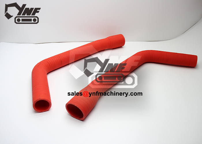 Excavator engine air delivery hose