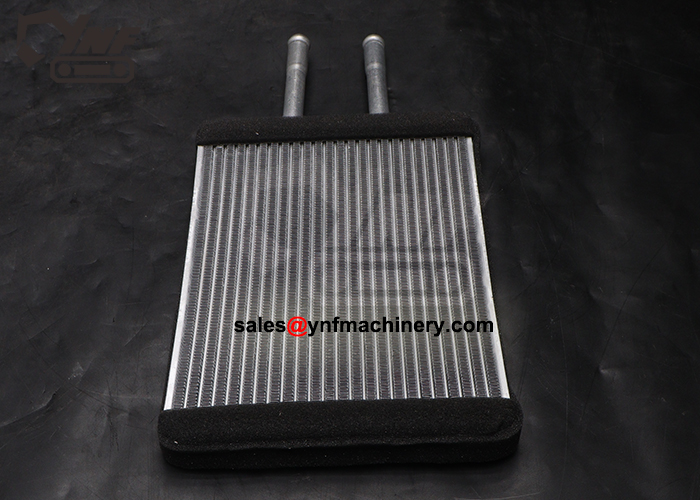Excavator cab heater radiator for warm air system