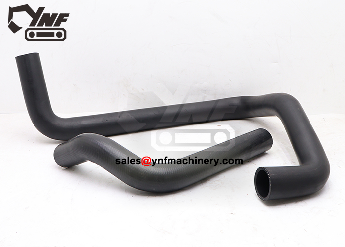 Excavator engine cooling hose assembly with upper lower pipes