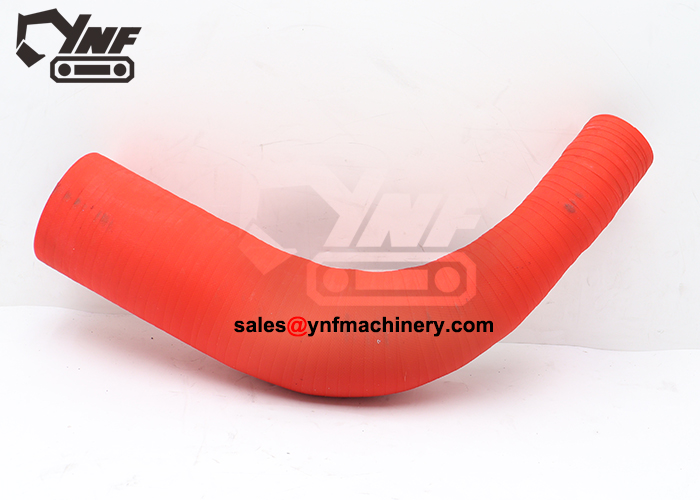 Heavy machinery engine rubber hose replacement