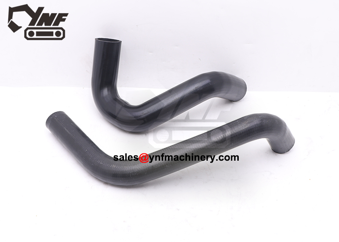 Heavy equipment radiator hose replacement component