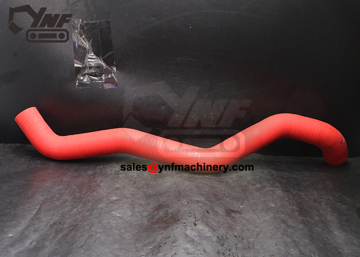 Excavator engine air connection pipe replacement