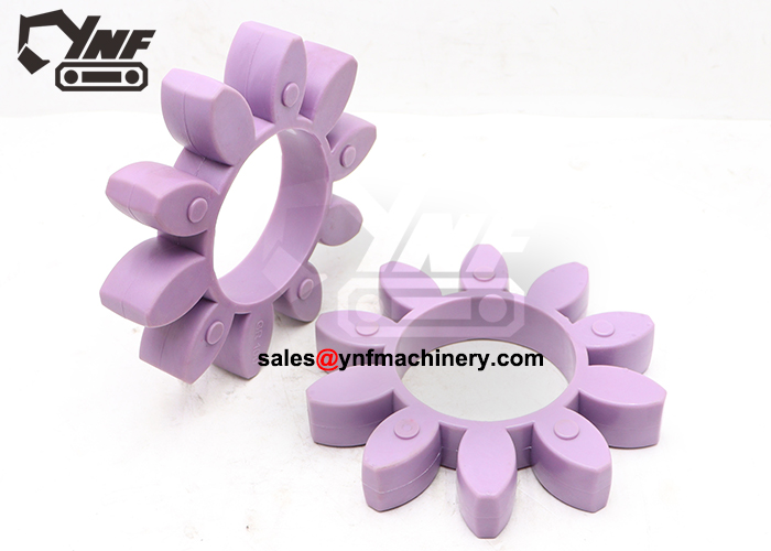 Heavy equipment vibration absorbing coupling
