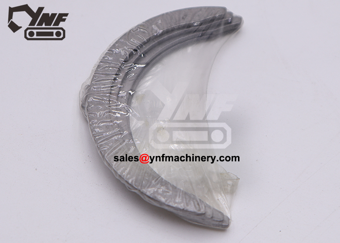 V2203 crankshaft end play control thrust plate