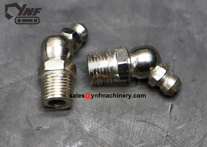 Excavator angled grease nozzle for restricted access points