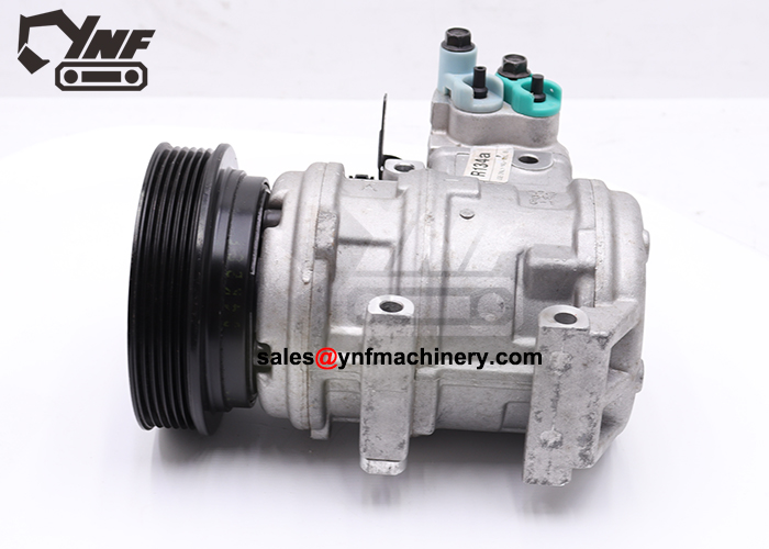 Excavator cabin AC compressor component