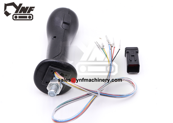 Heavy equipment control handle assembly