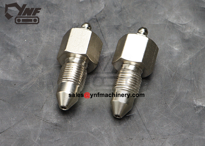 Hitachi undercarriage lubrication fitting for track adjustment